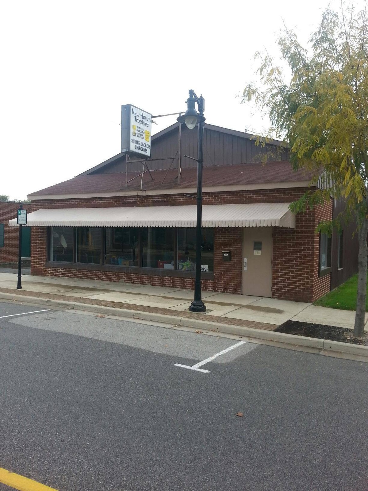 Storefront of New Haven Trophies & Shirts at 710 Broadway Street, New Haven, Indiana